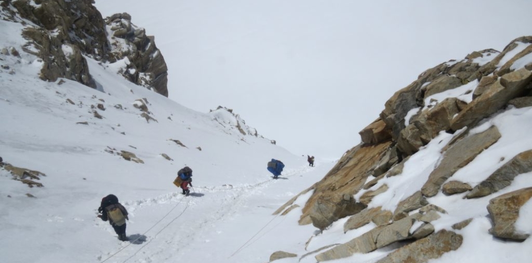 Rappelling down the steep incline into Khatling glacier