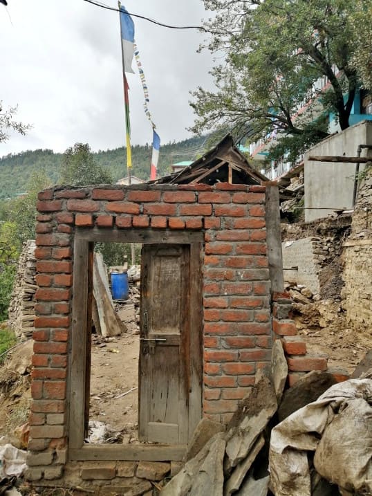 A dismantled building of a home in Kalpa
