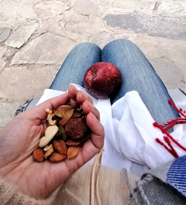 Apple, dried fruit, and nuts offered by Charang monastery nuns