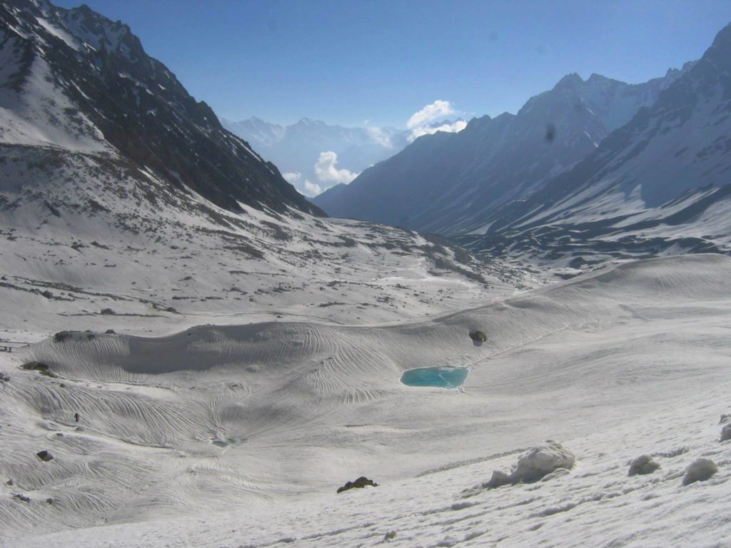 Looking backwards at Glacial Lake while climbing the Charang- La pass | Kinnaur Kailash Parikrama trek blog