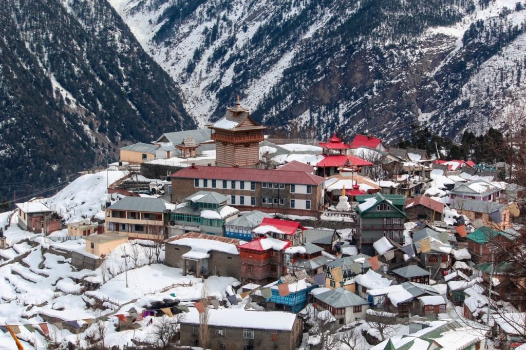 Rooftops of homes in Kalpa village covered with snow